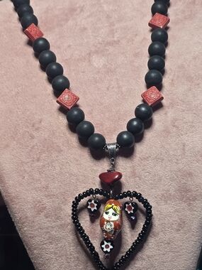 Red & White Nesting Doll In A Red & Blk Beaded Heart/Wire Beaded Necklace